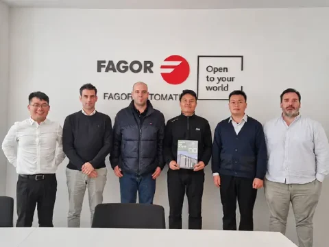 BCAMCNC engineering team visiting FAGOR Automation Spain for 5-axis aerospace CNC system optimization